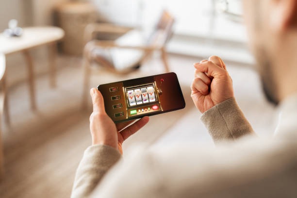 Mobile phone displaying pap tengtop platform interface with football markets and live betting options